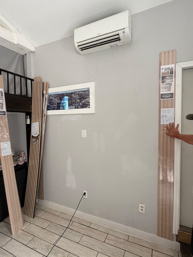 Wood slat panels staged before installation